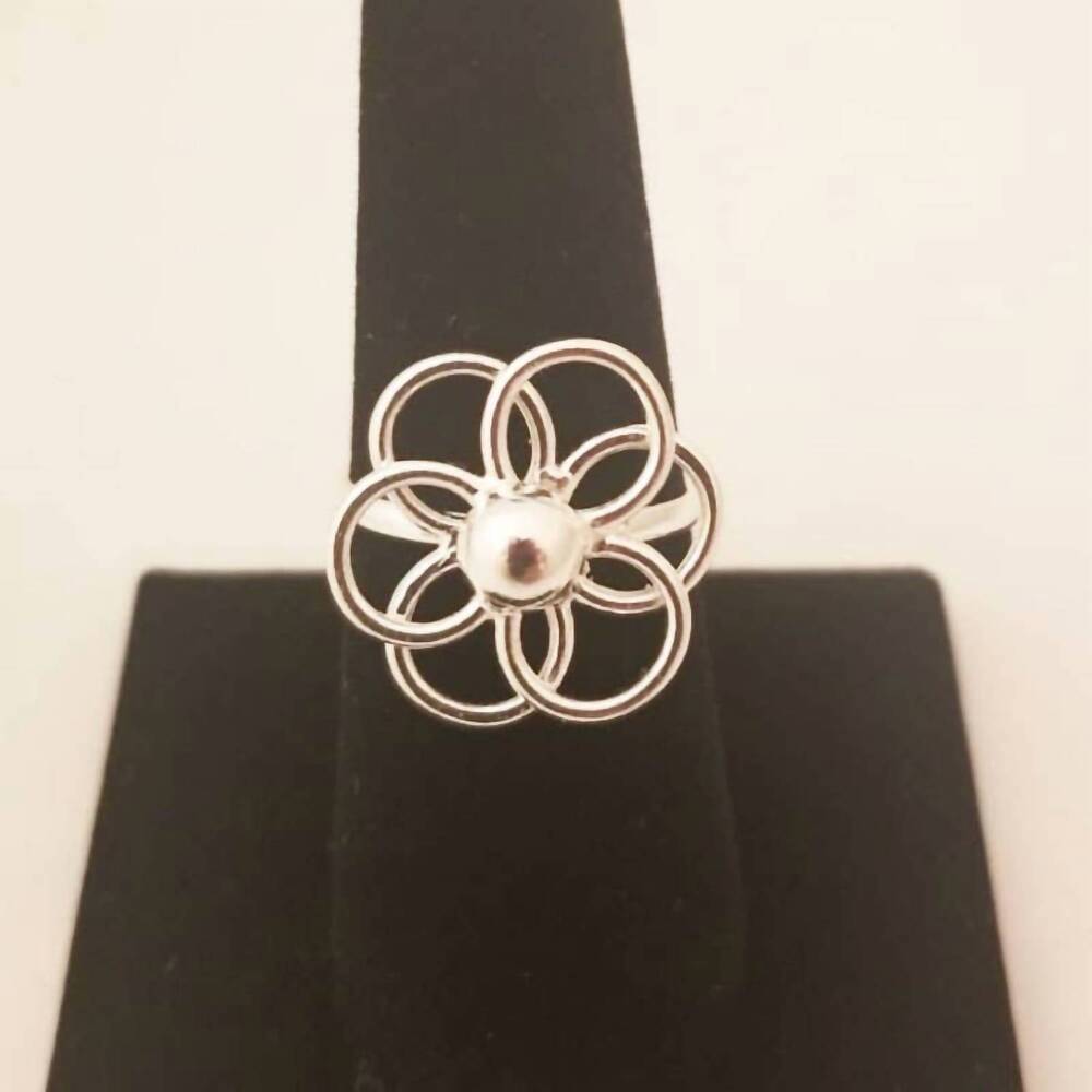 NEW COSTELLO INTERNATIONAL women's burning sun ring in silver